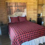 comfy beds inside camping cabins at silver spur resort