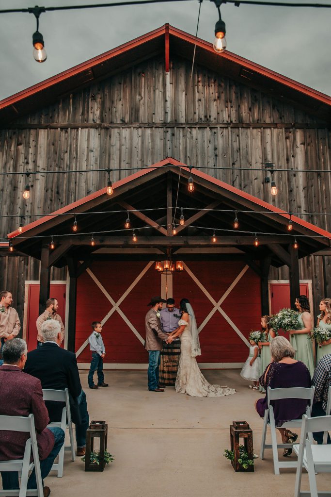 clinton and celeste wedding ceremony at the barn at the silver spur resort