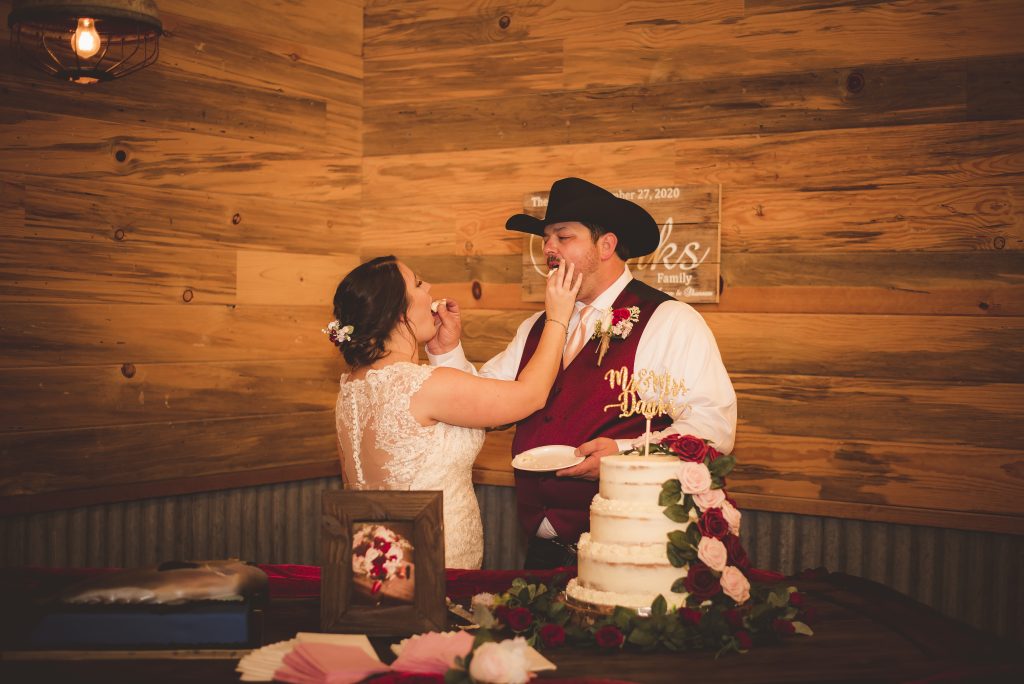 cutting the cake during wedding at silver spur resort